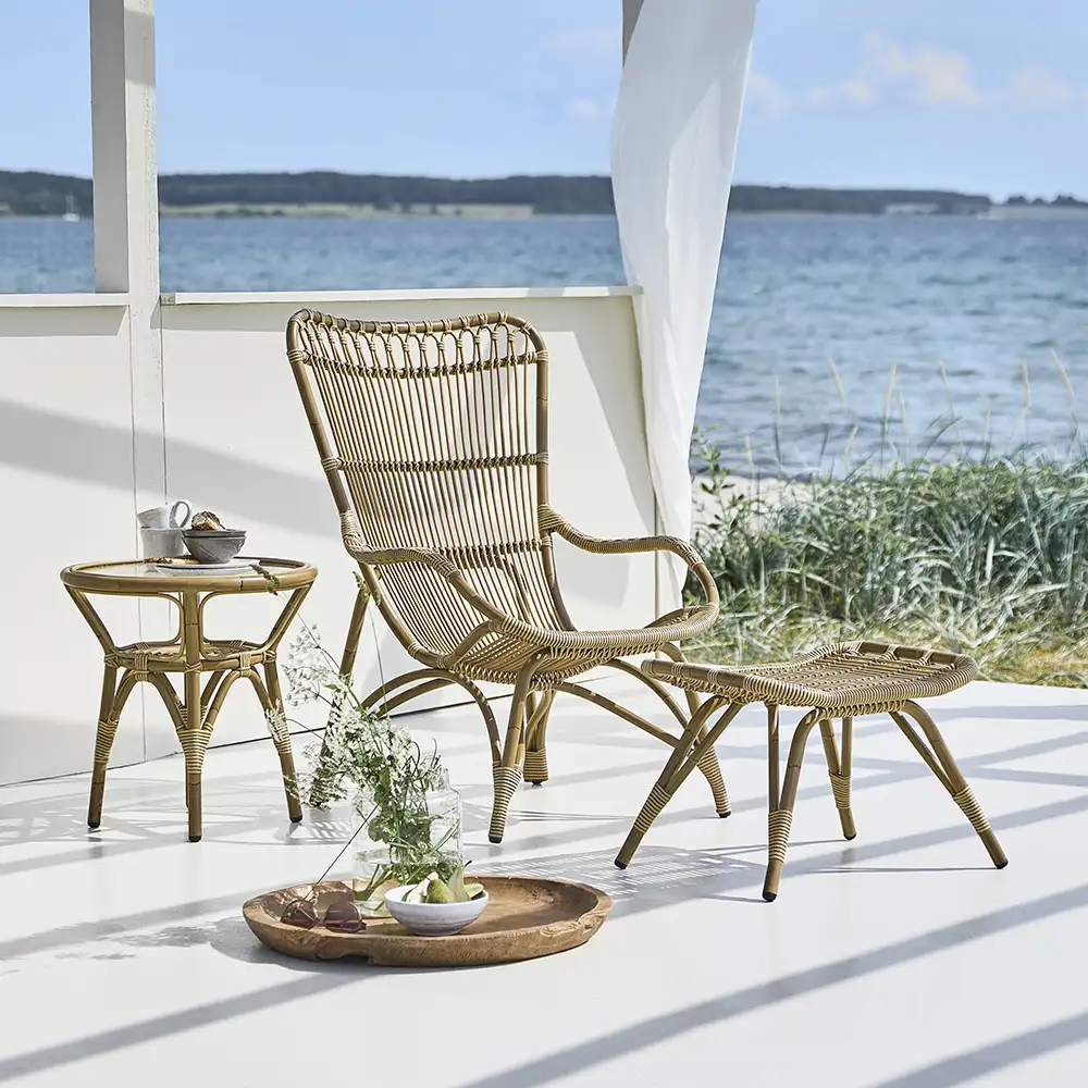 Monet lænestol af kunstrattan antik